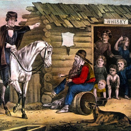 white man on white horse points to log cabin with white man sitting on log and family and dog looking on