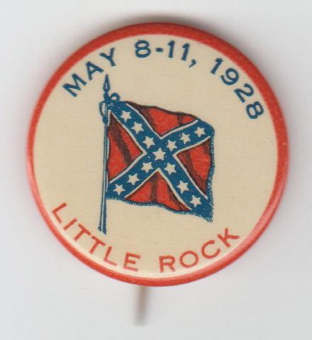 Round button with Confederate battle flag in center and blue and red text