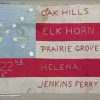 Flag with stars on blue field in upper left corner and text on red and white stripes