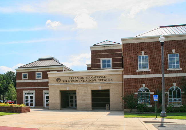 brick building with stone entryway "Arkansas Educational Telecommunications Network"