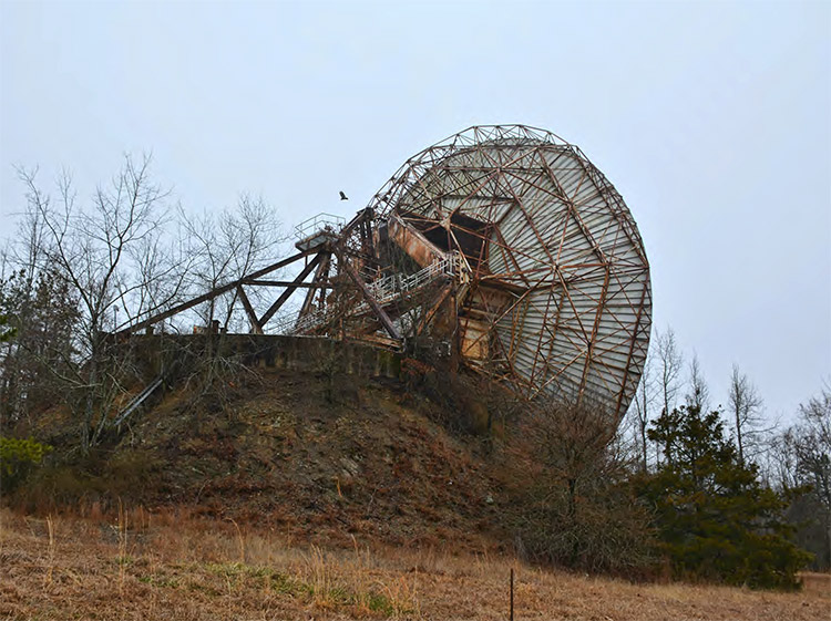 Back section of large radar dish with steel frame