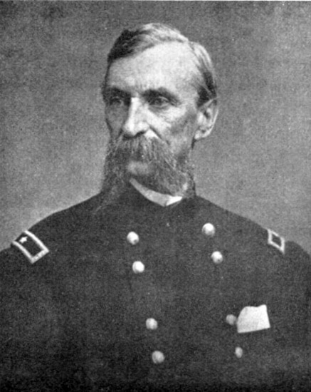 older White man with long mustache in military uniform