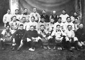 Group of white baseball players in  baseball uniforms with uniform "L R"