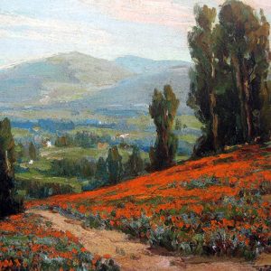 Rolling hills covered in trees and orange flowers with mountains