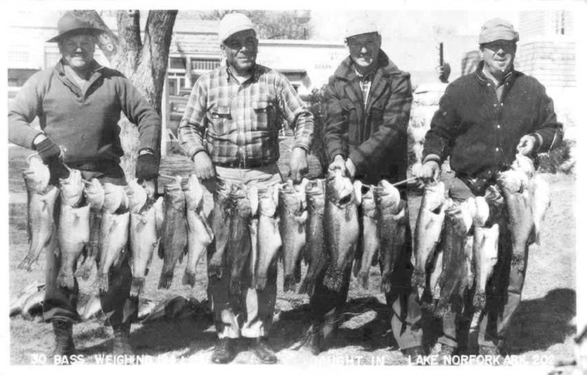 White men holding fish