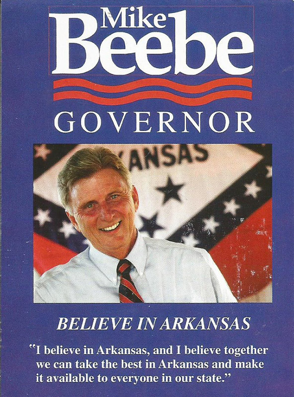 White man in shirt and tie smiling on blue background with white text on campaign flyer