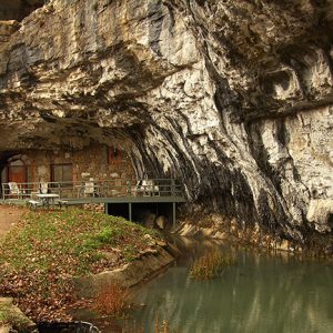 Rooms built into side of a cave with balcony and rock walls