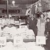 White man women and girl inside dry goods store