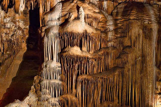 striated stalactites in cave