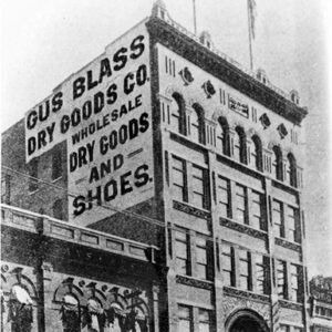 Five-story building "Gus Blass Dry Goods" with two-story buildings on either side