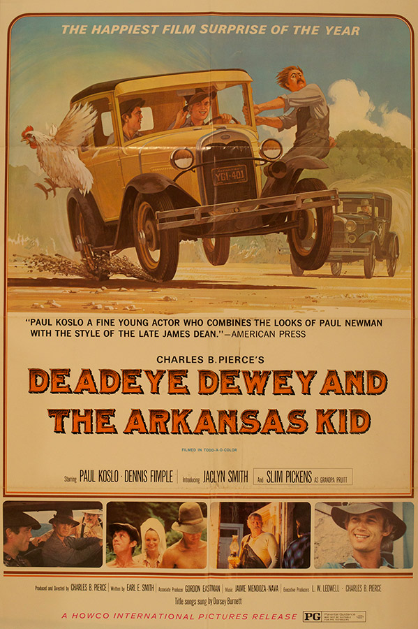 Movie poster featuring young white men driving yellow car with young white man hanging off its side in front of white man in black car