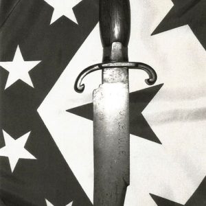 Large knife with curved hand guard on Arkansas flag background