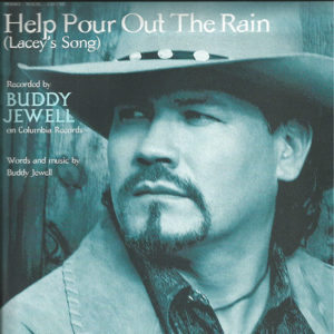 White man with beard and cowboy hat on album cover with blue tint and text
