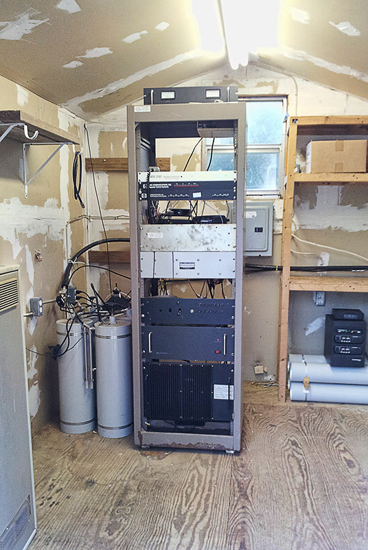 Radio equipment and shelves inside small building