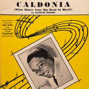 Portrait of African-American man smiling in suit on cover of Caldonia sheet music book