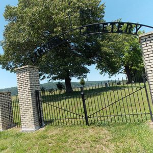 "Campbell Cemetery" iron gates with brick columns