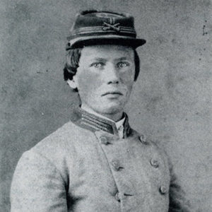 Young white man in gray military uniform
