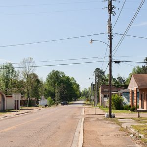 Street with brick buildings and and power lines