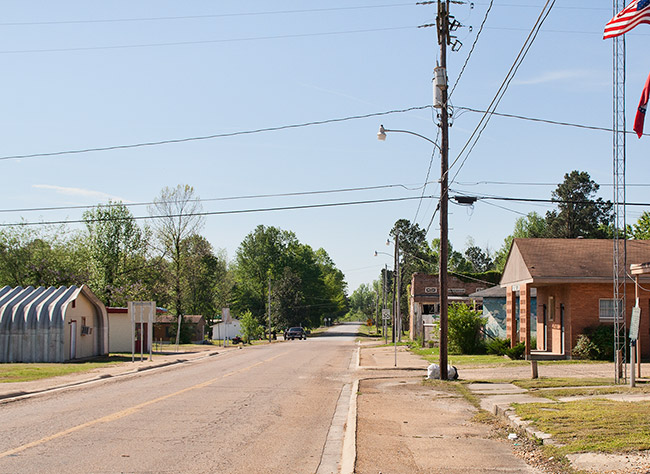 Street with brick buildings and and power lines