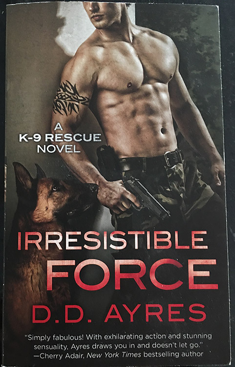 Shirtless young man in camouflage pants with pistol and German Shepherd dog with text on book cover