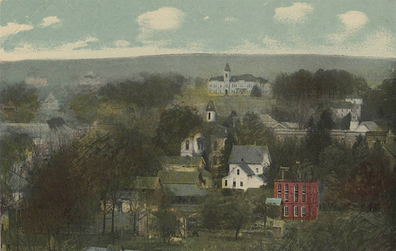 Painting of multistory town buildings and trees and hills in the background