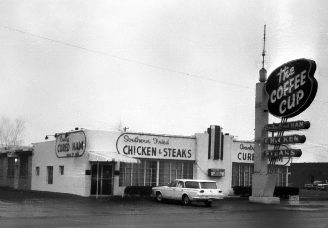 small white building advertising "Southern Fried Chicken and Steaks"