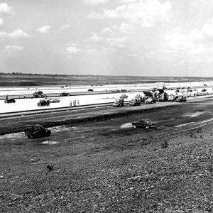 Vehicles on unfinished air strip