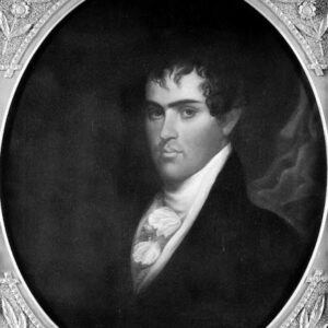 Young white man with curly hair in suit and cravat