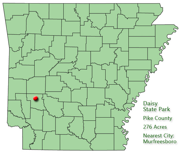 map outlining Arkansas counties with red pin in southwest quadrant