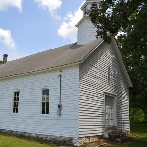 Single-story church building with cupola