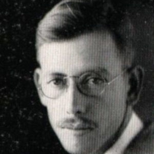 White man with round glasses