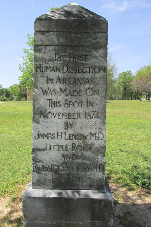 "The first human dissection in Arkansas was made on this spot in November Eighteen Seventy-Four" inscription on stone monument in park