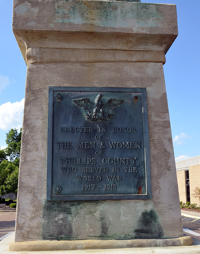 "Erected in honor of the men & women of Phillips County who served in the World War Nineteen seventeen to Nineteen eighteen" plaque on monument
