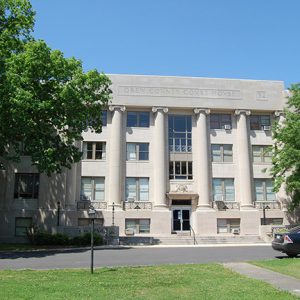 Four-story building with "Drew County Court House" written on it