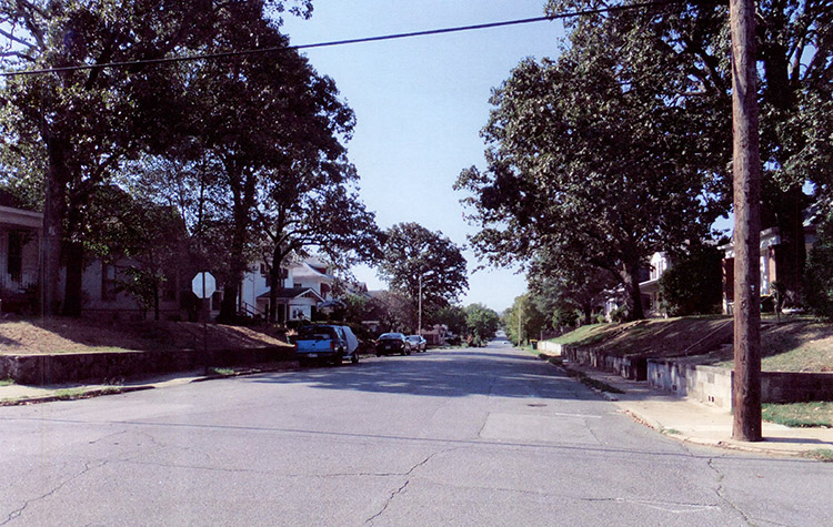houses and parked cars on street in residential neighborhood