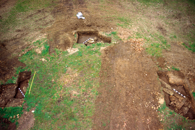 Aerial view of excavation sites showing the corners of a former courthouse