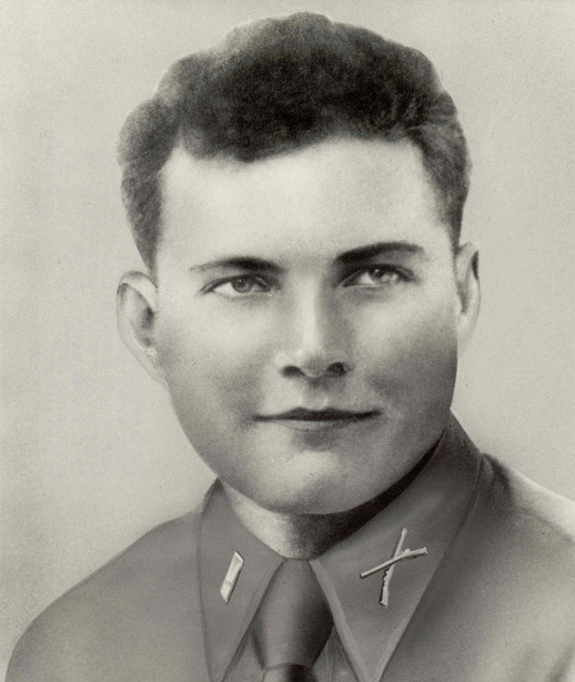 Young white man smiling in military uniform