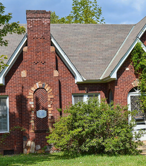 Close-up of brick house with chimney