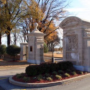 ornate stone pillars and iron gates