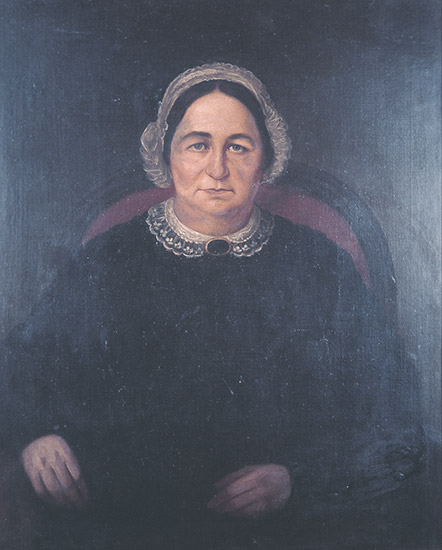Painting of older white woman in black with black hair with brooch in red chair