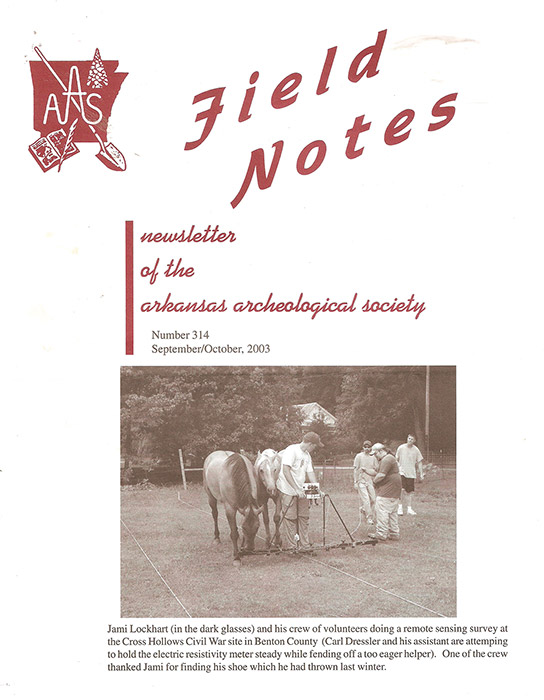 White volunteers using archaeological equipment in field with horses on cover of "Field Notes" publication