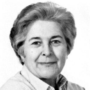 Older white woman with short gray hair and collared shirt