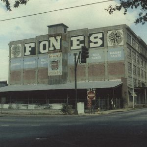 Multistory "Fones" building on city street corner