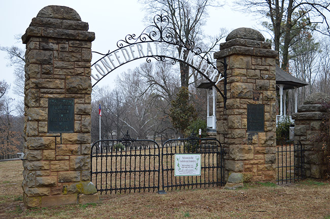 Cemetery gates with brick columns and arched sign "Confederate Cemetery"
