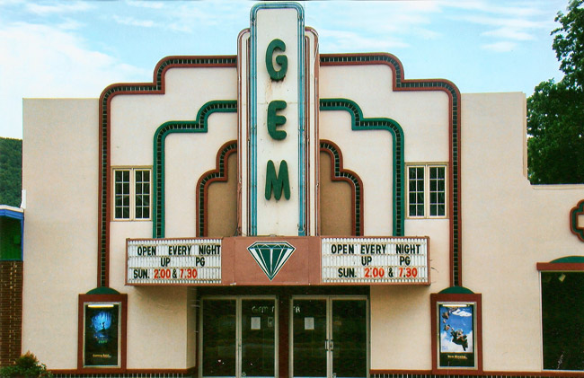 Multistory "Gem" theater building with marquee on street