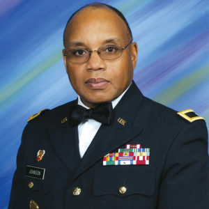 African-American man with glasses in military uniform