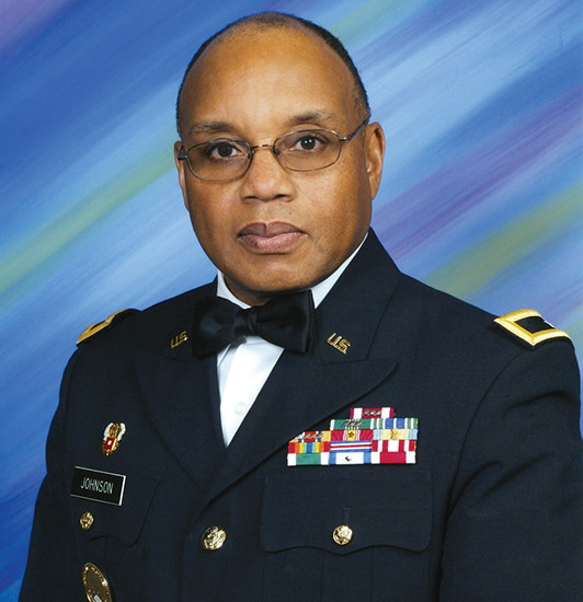African-American man with glasses in military uniform
