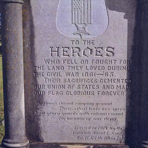 Shield and "To the Heroes" inscription on stone monument