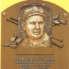 Bust of white man with cap on "George Clyde Kell" plaque