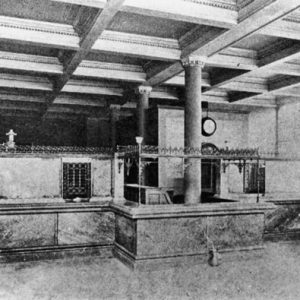 Room with tiled ceiling, cashier's desks and columns